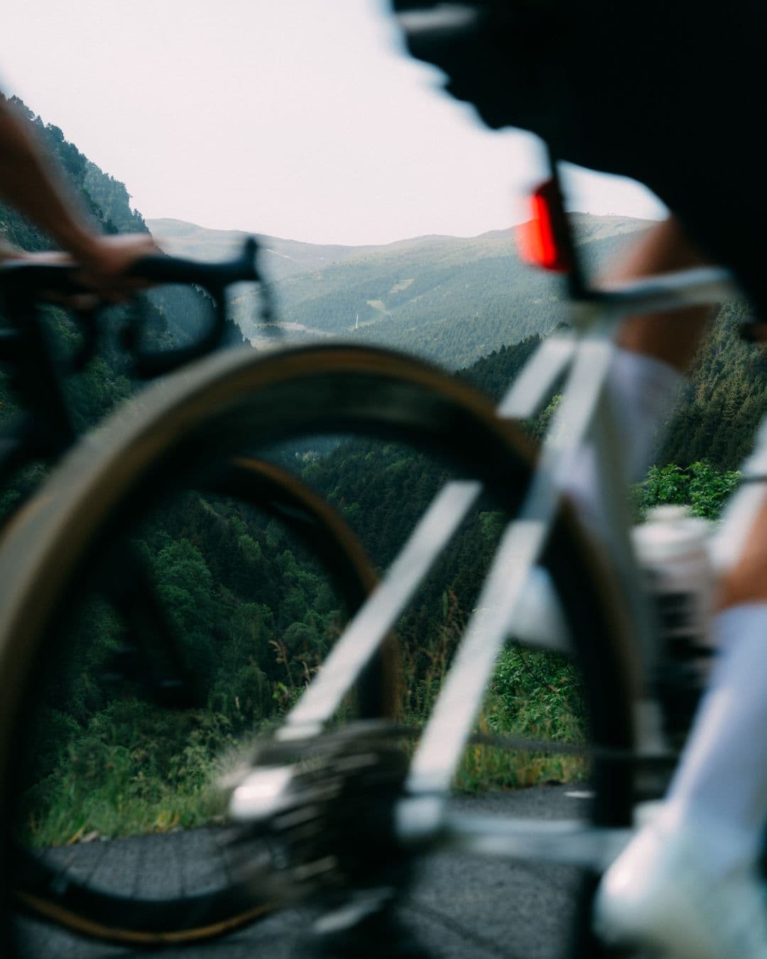 Cyclist riding through the mountains