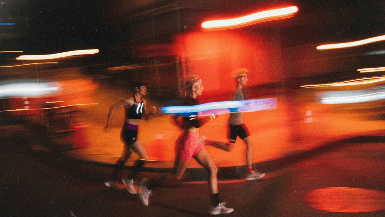 Runners training together at night